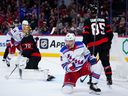 New York Rangers centre Jonny Brodzinski (22) celebrates his goal on Ottawa Senators goaltender Joonas Korpisalo (70) during second period NHL hockey action in Ottawa on Saturday, Jan. 27, 2024.
