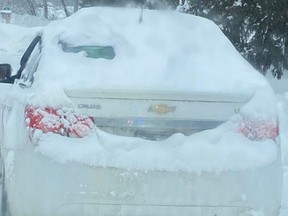 Police in MRC des Collines area call snow covered cars such as this offender stopped yesterday 'igloomobiles.'