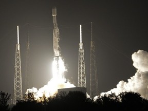 A SpaceX Falcon 9 rocket, with a payload including two lunar rovers from Japan and the United Arab Emirates, lifts off from Launch Complex 40 at the Cape Canaveral Space Force Station in Cape Canaveral, Fla., on Dec. 11, 2022.