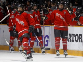 Ottawa celebrates its first goal ever Tuesday night in its PWHL home opener against Montreal.
