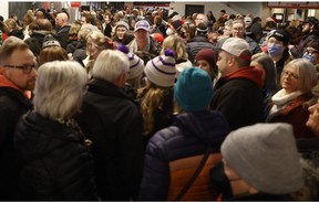 Fans arrive for the PWHL home opener between Ottawa and Montreal at the TD Place Arena in Ottawa on Tuesday.
