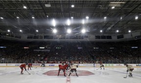 The puck is dropped at centre ice to begin the Ottawa PWHL home opener against Montreal at the TD Place Arena on Tuesday.