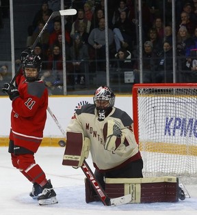 Ottawa's Akane Shiga battles in front of the net Tuesday night during the first period against Montreal.