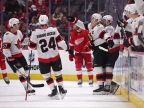 Brady Tkachuk #7 of the Ottawa Senators celebrates his second-period goal with teammates against the Detroit Red Wings.