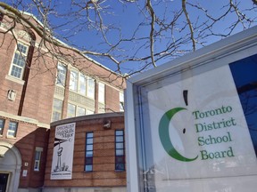 A Toronto District School Board sign is shown in front of a high school in Toronto on Tuesday, Jan. 30, 2018.