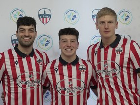 From left: Luca Piccioli, Matteo de Brienne and Kris Twardek appeared at a ceremony, hosted by the Caldwell Family Centre, to launch Atletico Ottawa's primary jersey.