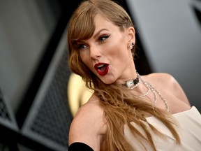 Taylor Swift and her watch choker at the 66th Grammy Awards on February 4.