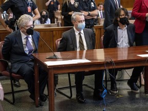 From left, Glenn Horowitz, Craig Inciardi and Edward Kosinski appear in criminal court after being indicted for conspiracy involving handwritten notes from the famous Eagles album "Hotel California," July 12, 2022, in New York.