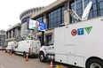 Satellite trucks were lined up outside RBC Place convention centre ahead of a London police press conference on Monday Feb. 5, 2024. Mike Hensen/The London Free Press