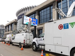 Satellite trucks were lined up outside RBC Place convention centre ahead of a London police press conference on Monday Feb. 5, 2024. Mike Hensen/The London Free Press
