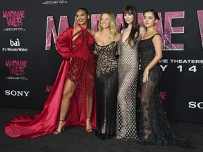 Celeste O'Connor, from left, Sydney Sweeney, Dakota Johnson and Isabela Merced arrive at the premiere of "Madame Web," Monday, Feb. 12, 2024, at the Regency Village Theatre in Los Angeles.