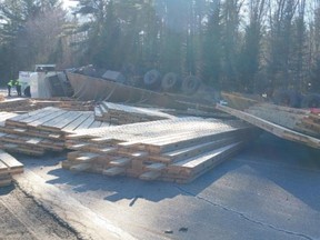 The dumped load of lumber led to the closure of a section of Highway 17 for about three hours on Monday, OPP said.