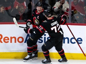 Ottawa Senators captain Brady Tkachuk celebrates with Thomas Chabot after scoring against the Columbus Blue Jackets in the first period on Tuesday, Feb. 13, 2024.