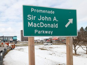 City of Ottawa signs showing the name Sir John A MacDonald (sic) Parkway remained on Carling Avenue earlier this week, five months after the parkway's name was changed to Kichi Zibi Mikan. The city says the old signs are coming down this week.