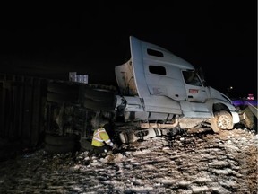 Tractor-trailer with load of peat moss fishtailed and left the road on Highway 401 near Prescott Saturday, Feb. 2