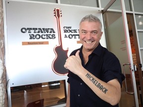 Tierney says he “begged” Bluesfest director Mark Monahan to bring Nickelback back this summer, to which Monahan jokingly replied, ‘Okay. Get a tattoo and we’ll see.’