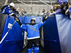 Renata Fast of Toronto greets fans before playing New York in their PWHL hockey game at the Mattamy Athletic Centre on Monday, Jan. 1, 2024, in Toronto. Fast is averaging the second most ice time in the PWHL this season, behind teammate Jocelyne Larocque.