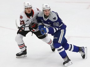 Nathan Villeneuve, right, who is from Ottawa and plays for the OHL's Sudbury Wolves, is seen in action against the Niagara IceDogs on Feb. 9, 2024.