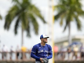 Blue Jays starting pitcher Jose Berrios pitches in the third inning of a spring training game against the Pittsburgh Pirates Tuesday, March 5, 2024, in Bradenton, Fla.