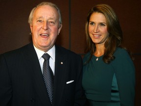 Brian Mulroney and his daughter Caroline pose for a picture at St. Francis Xavier University