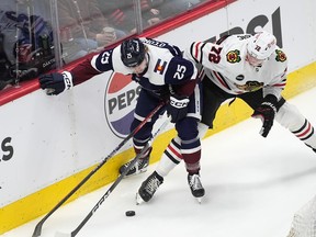 Colorado Avalanche right wing Logan O'Connor (left)