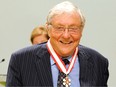Roy McMurtry is seen in September 2010 after receiving his Officer of the Order of Canada medal.