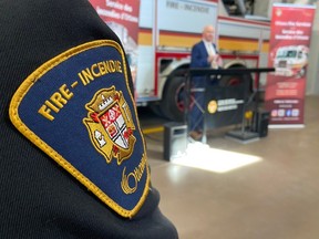 Scott Maxwell, executive director of Wounded Warriors Canada, speaks to members of the Ottawa Fire Service about the new partnership that will bring Wounded Warriors' mental health services to firefighters and their families on Thursday March 7, 2024
