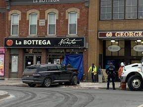 George Street in the ByWard Market was closed after a vehicle crashed into the front side of La Bottega Nicastro Italian grocer on Tuesday afternoon.