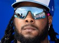 Toronto Blue Jays Vladimir Guerrero Jr. looks out from the dugout prior to spring training action against the Tampa Bay Rays in Dunedin, Fla. on Wednesday February 28, 2024.
