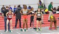 CeCe Telfer (second from left) competes in an NCAA track and field event