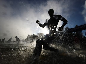 Competitors start during the Ironman Mont-Tremblant event in August 2018.