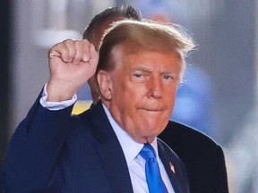 Trump raising fist