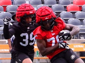Jahquan Bloomfield (79) catches the ball as he is defended by Bralen Traham (39) during the Ottawa Redblacks rookie camp held at TD Place in Ottawa on May 9, 2024.