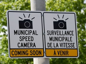Municipal Speed Camera signs on Smyth Road in Ottawa.