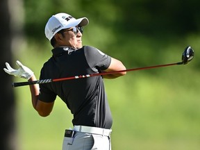 C.T. Pan of Taiwan lets go of his club after hitting his tee shot on the 15th hole during the second round of the RBC Canadian Open at Hamilton Golf & Country Club on May 31, 2024 in Hamilton, Ontario.