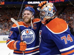Connor McDavid and goalie Stuart Skinner of the Edmonton Oilers celebrate on June 2 after beating the Dallas Stars 2-1 in Game 6 of the Western Conference final to advance to the Stanley Cup final against Florida.