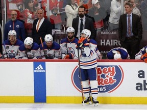 Zach Hyman of the Edmonton Oilers looks on while teammates react after their 2-1 loss against the Florida Panthers in Game 7 of the 2024 Stanley Cup final at Amerant Bank Arena on June 24, 2024 in Sunrise, Florida.