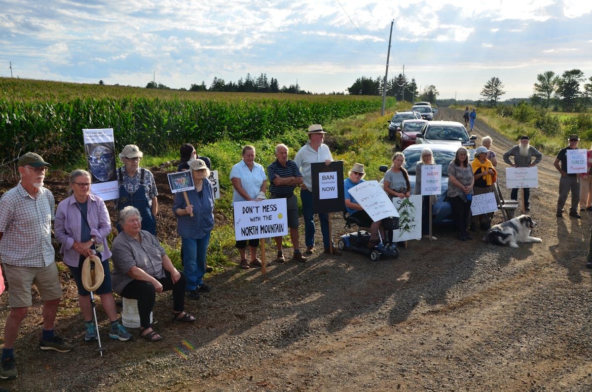 a group of concerned citizens gathered on mcnally road in the burlington, kings county, area on sept. 1 for a rally protesting the planned aerial spraying of glyphosate on a nearby recovering clearcut. protestors have also occupied the spray site. kirk starratt