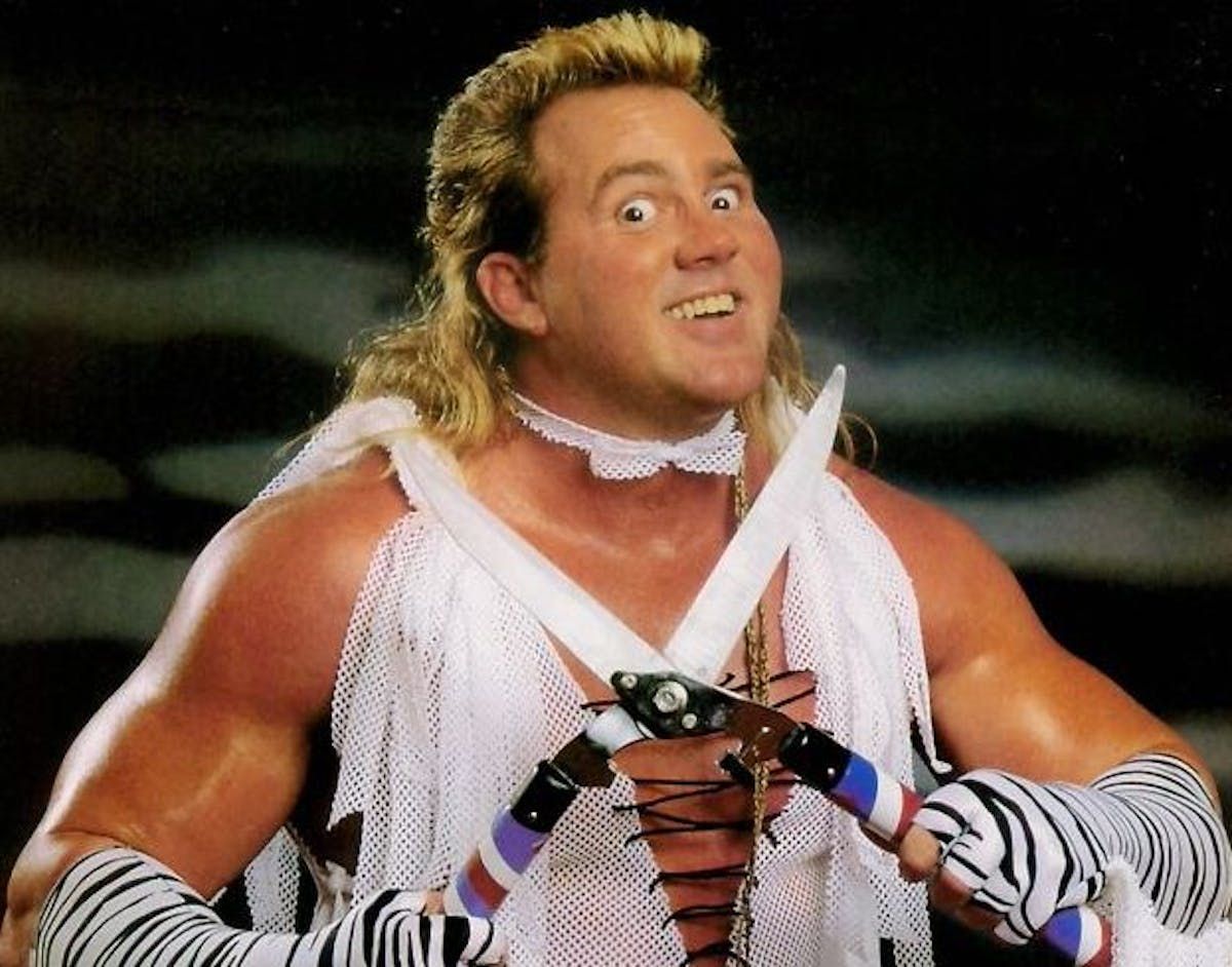 Brutus 'The Barber' Beefcake cuttin' and struttin' into
