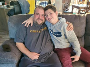 Survival mode: Father and son hunters endure cold, wet night in