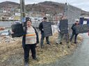 Some of the protestors awaiting Pierre Poilievre arrival at the Petty Harbour fishermen's co-op during his campaign stop in St. John's on April 1, 2025. The group was there because they believe Poilievre is leading us in the same direction as the U.S. politically. Cameron Kilfoy/The Telegram