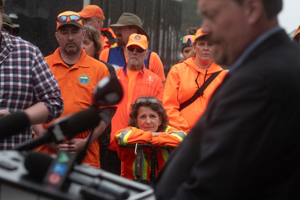Search and Rescue volunteers watch during an announcement that the search for missing Pictou County children, Lily and Jack Sullivan, is being scaled back. Search and Rescue volunteers watch during an announcement that the search for missing Pictou County children, Lily and Jack Sullivan, is being scaled back.