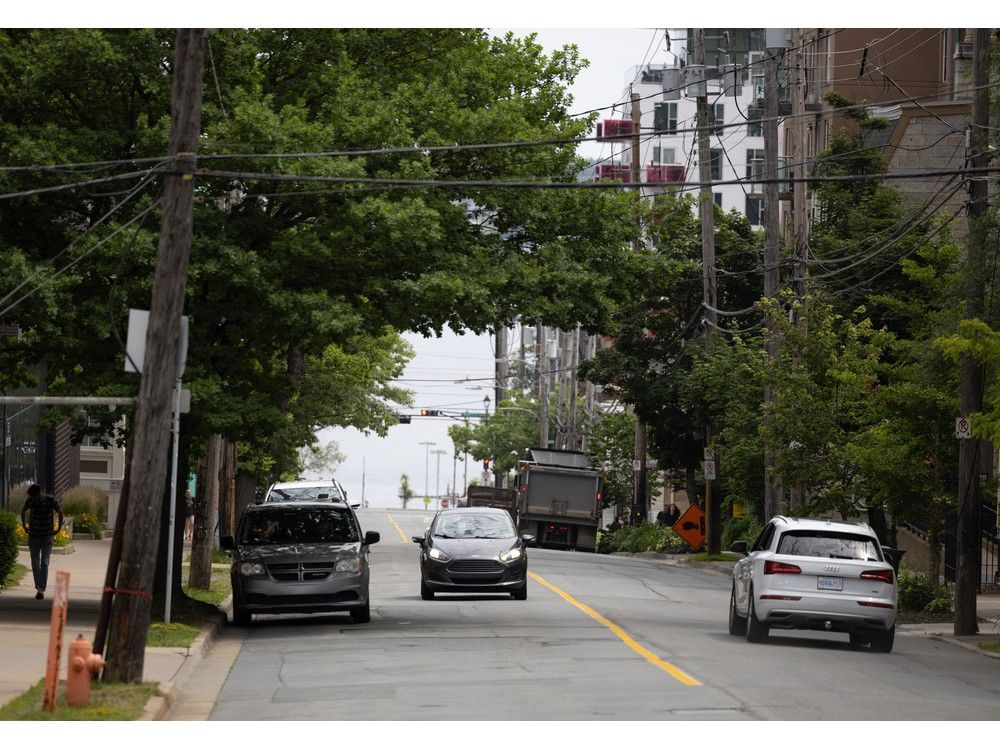  vehicles pass down morris street in between hollis and queen streets on july 9.