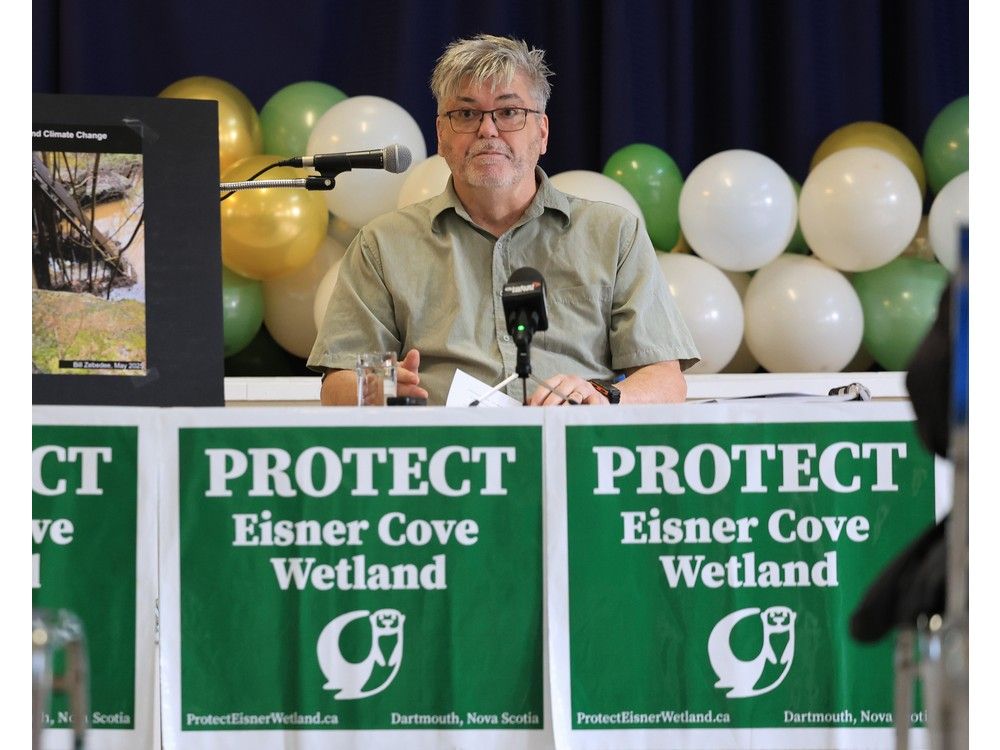  bill zebedee, president of protect eisner cove wetland, announces he has filed a private prosecutive case against mount hope development at a news conference in dartmouth on friday, aug. 1, 2025.