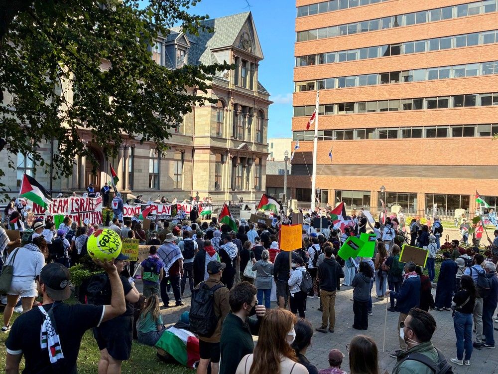 Protestors gather in front of Halifax City Hall on Friday. – GLENN MacDONALD Protestors gather in front of Halifax City Hall on Friday. – GLENN MacDONALD