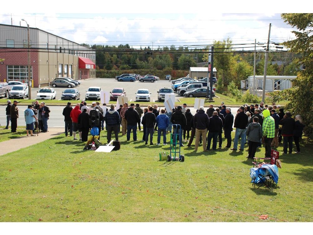 Dozens of people gather on the lawn of the Myles F. Burke Police Headquarters in Sydney in protest of the federal gun buy back program that is starting in Cape Breton on Oct. 2. The police station closed that day to the public, in advance of the protest. The people in this photo arrived for the beginning of the five hour protest and faced the road. More people arrived throughout the protest which ran from noon to 5 p.m. NICOLE SULLIVAN / CAPE BRETON POST Dozens of people gather on the lawn of the Myles F. Burke Police Headquarters in Sydney in protest of the federal gun buy back program that is starting in Cape Breton on Oct. 2. The police station closed that day to the public, in advance of the protest. The people in this photo arrived for the beginning of the five hour protest and faced the road. More people arrived throughout the protest which ran from noon to 5 p.m. NICOLE SULLIVAN / CAPE BRETON POST
