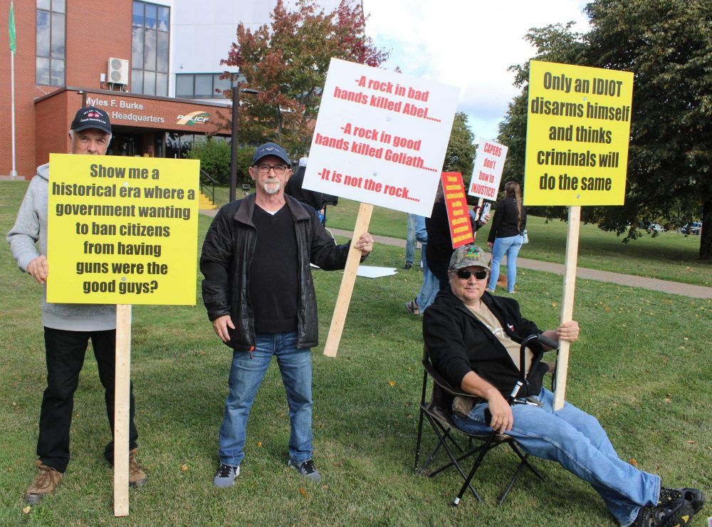 From left, David Morrison of Leitches Creek, Barry Hennessey of Whitney Pier, and Jonathan Pretty from Albert Bridge, peacefully rally outside Cape Breton Regional Police headquarters in Sydney: “We know crime isn’t committed by law-abiding people that have permits,” Hennessey said. From left, David Morrison of Leitches Creek, Barry Hennessey of Whitney Pier, and Jonathan Pretty from Albert Bridge, peacefully rally outside Cape Breton Regional Police headquarters in Sydney: “We know crime isn’t committed by law-abiding people that have permits,” Hennessey said.