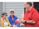 Acadie-Annapolis MP Chris d'Entremont hands out Canada flags during 2025 Canada Day festivities on Yarmouth's waterfront. TINA COMEAU