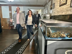 Chris d'Entremont enters the Fundy Restaurant in Digby with his wife Anne on election night in April 2025. The incumbent Conservative candidate had been elected to the Acadie-Annapolis riding. It was his third time being elected to the riding, which was formerly known as West Nova. Just over six months later, he's now crossed the floor of the House of Commons to sit with the Liberal caucus. TINA COMEAU