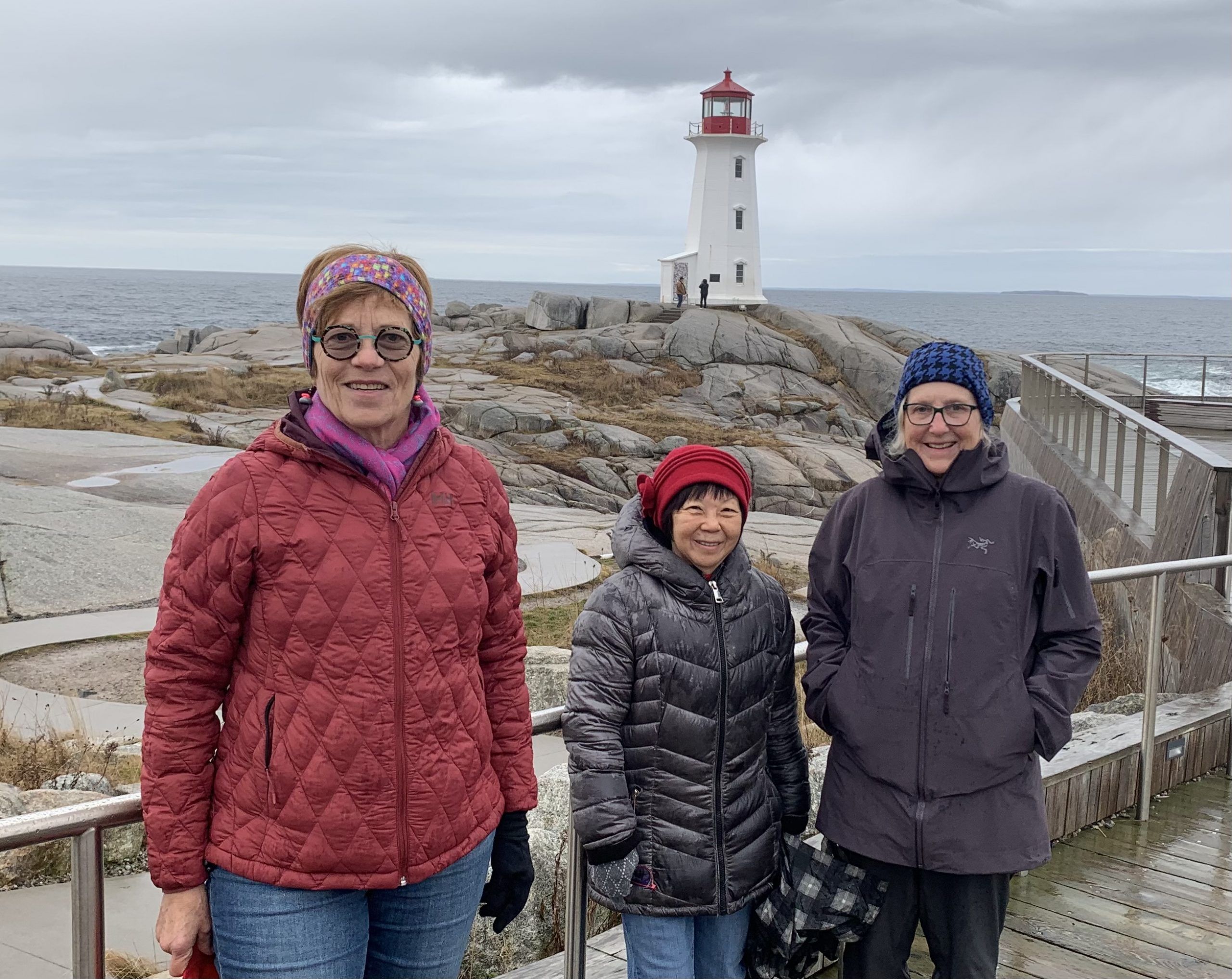 janice wainwright, left, kikuye inouye and kim plaxton took in the views at peggys cove on friday.